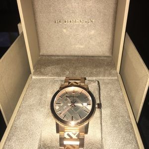 Burberry rose gold woman’s watch